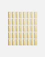 Forty gold metallic cutting blades and bolts by YARBO, arranged in a uniform grid, each piece featuring a circular hole.